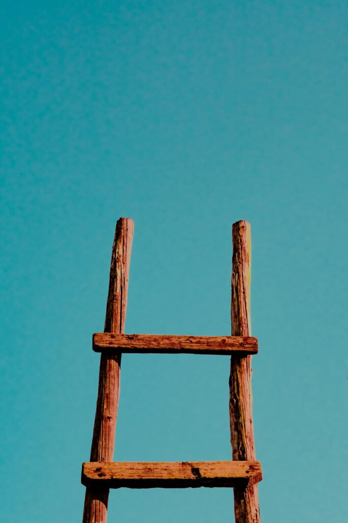 A ladder disappearing into the sky — symbolising UK film and TV crew careers after the pandemic.
